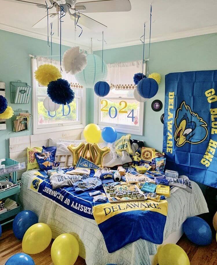 College bed party with blue and white dorm decor
